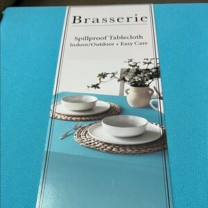 New! Brasserie Turquoise Spillproof Tablecloth. 70 inch round.